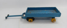 Load image into Gallery viewer, Vintage Blue Pull Wagon, Dinky Toys, Made in England, approx. 3 1/2&quot; L
