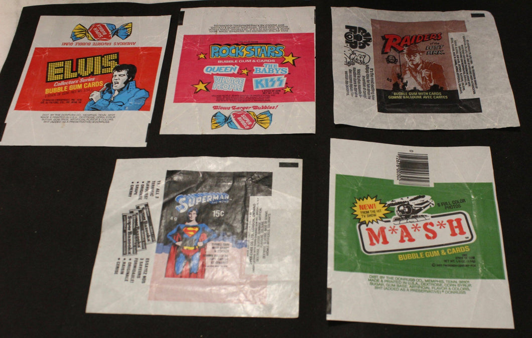 5 Misc Wrappers Lot - Indiana Jones, Elvis, Superman, MASH, and Rockstars